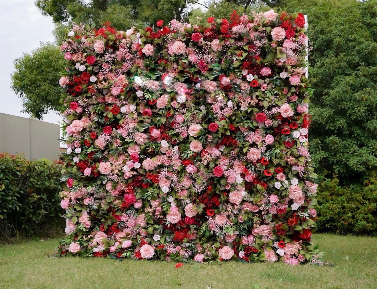 The Red and Pink Rose flower wall with red, blush and pink flowers